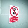 Do not climb on shelving sign