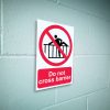 Do not cross barrier sign