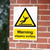 CA-SLIP-PORT-001-02-BRICK-WALL-WM Warning Slippery Surface Safety Sign | A5, A4, A3 | Easi-Signs