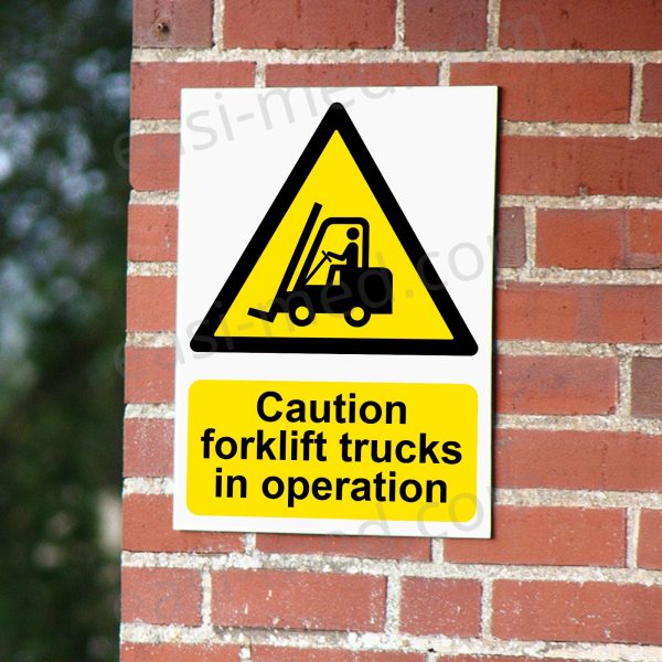 CA-FORK-PORT-001-07-BRICK-WALL-WM-1.jpg Caution Forklift Trucks in Operation Sign - Active MHE Warning | A5, A4, A3 | Easi-Signs