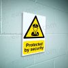 CA-GUARD-PORT-001-14-BLOCK-WALL-WM-1.jpg Protected by Security Sign - Total Site Protection Notice | A5, A4, A3 | Easi-Signs