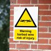 Warning barbed wire risk of injury Sign - Perimeter Safety & Hazard Alert | A5, A4, A3 | Easi-Signs